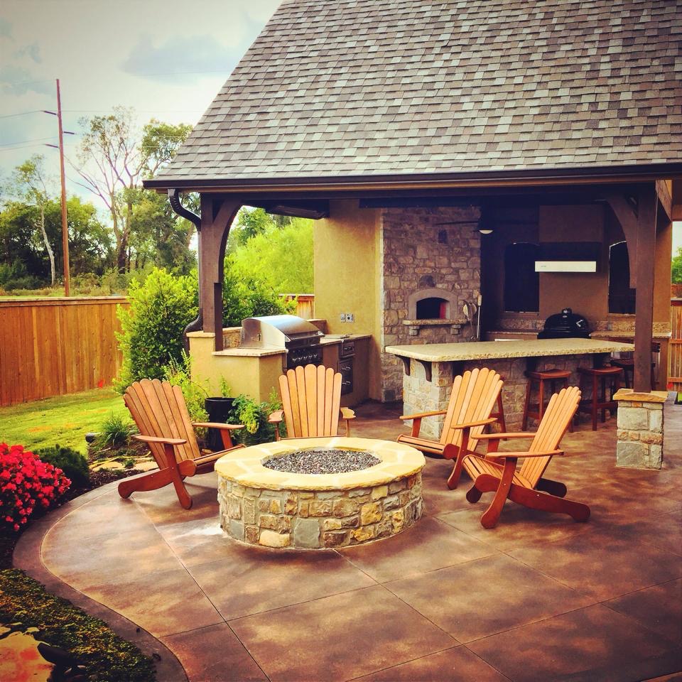 Image of outdoor chairs near outdoor fireplace